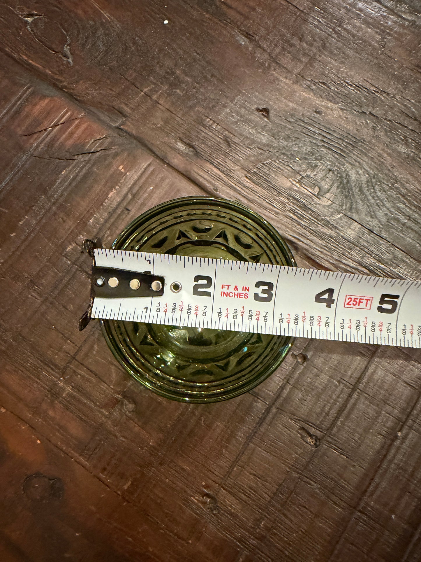 A mid-century  green pressed glass goblet by Indiana Glass.