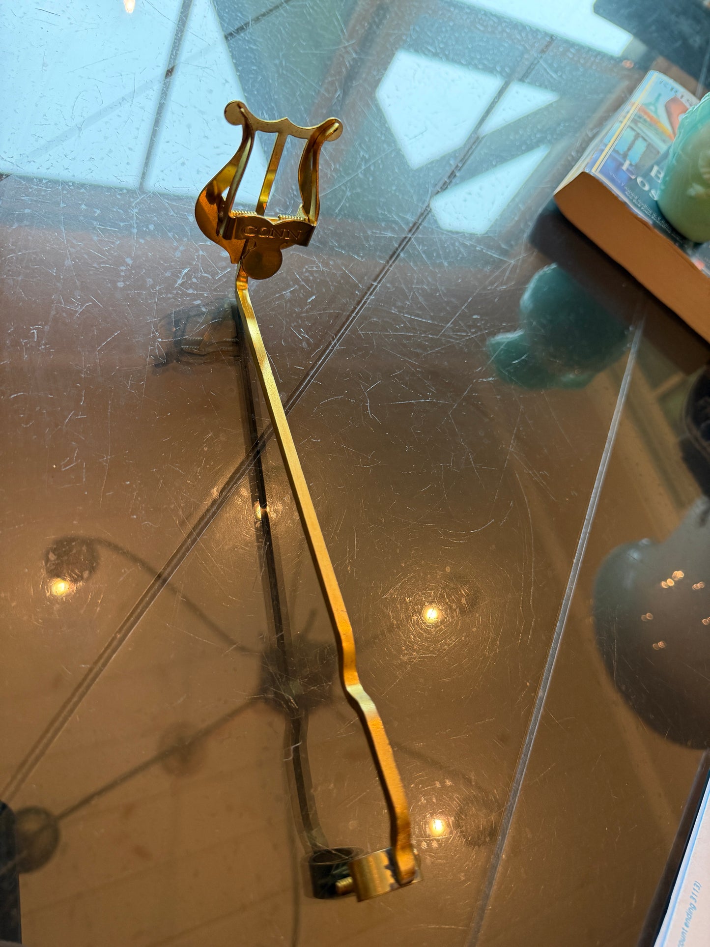 Brass lyre music holder by Conn
