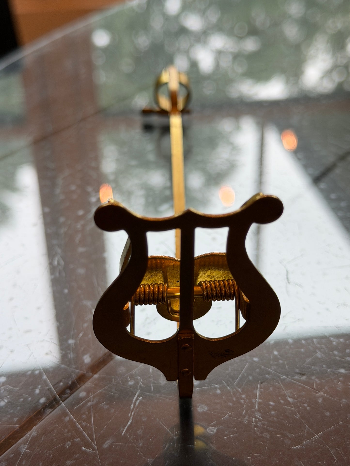 Brass lyre music holder by Conn