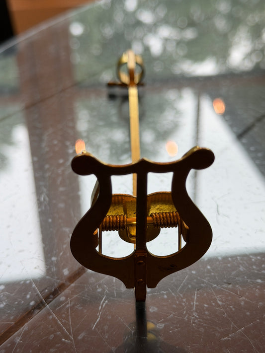 Brass lyre music holder by Conn